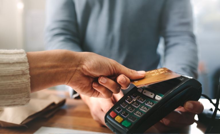 Person using card machine